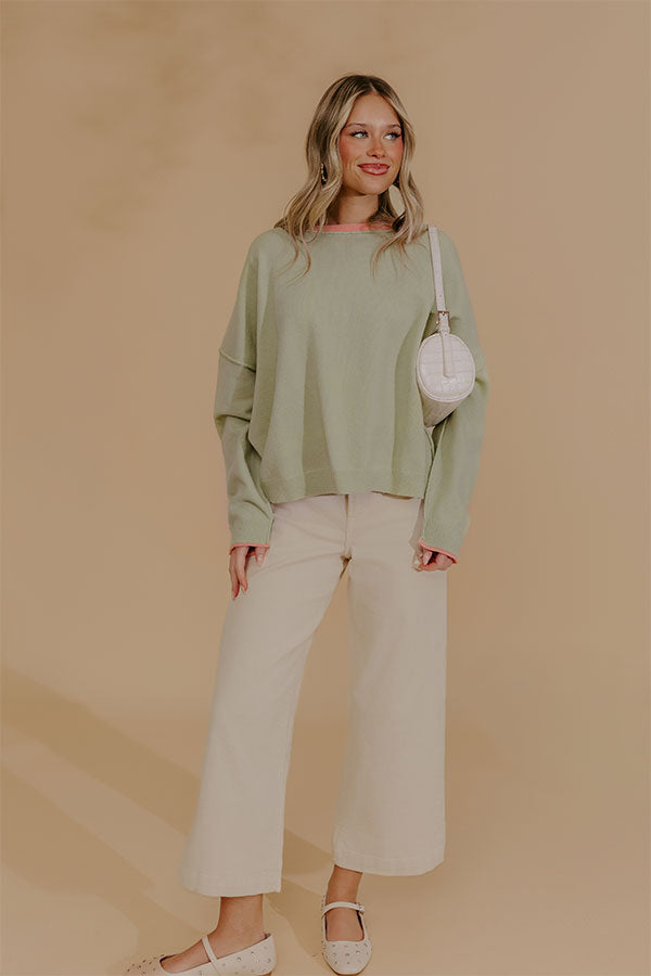 Oversized Knit Top with Coral Trim and Exposed Seam Details
