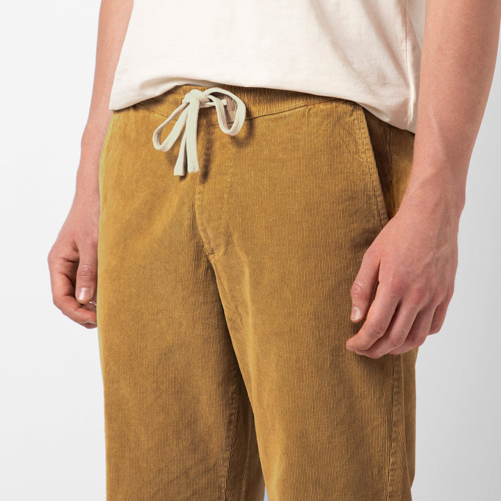 Corduroy Easy Pant British Khaki close up on model