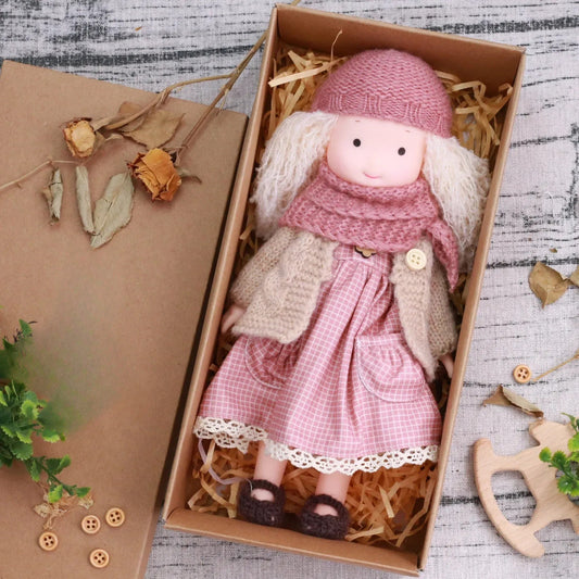 Dress-Up Plush Doll With Soft Vinyl Face And Removable Knitted Outfit