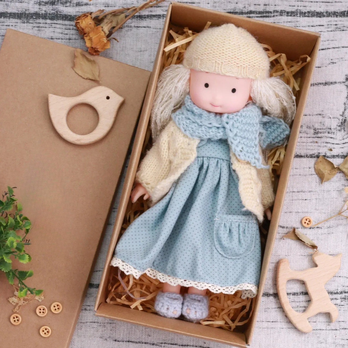Dress-Up Plush Doll With Soft Vinyl Face And Removable Knitted Outfit