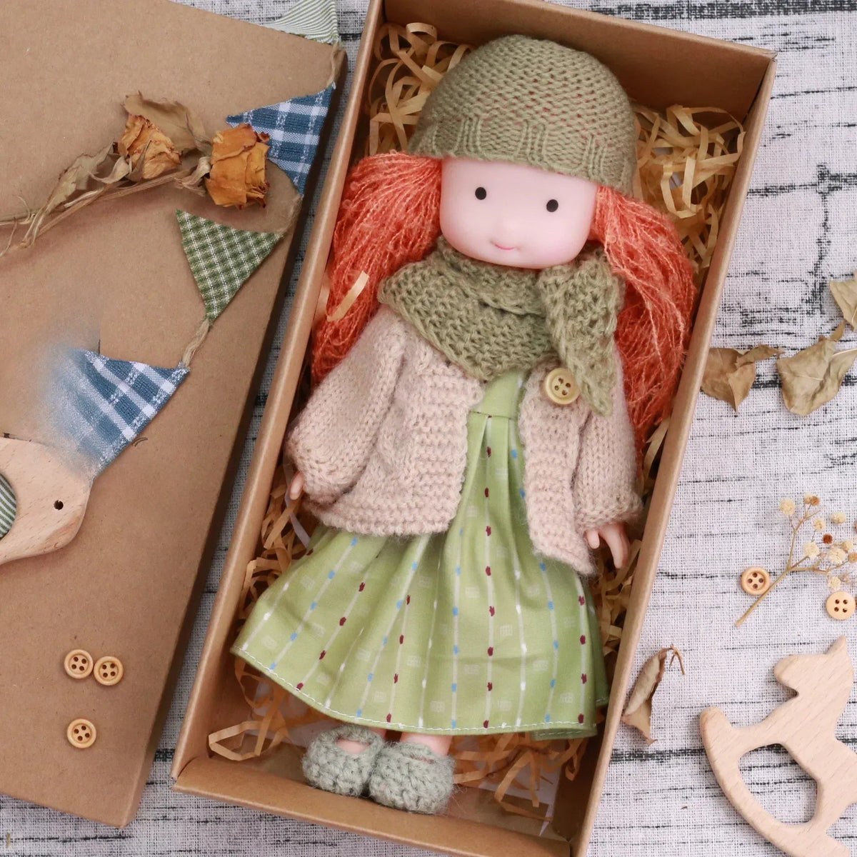 Dress-Up Plush Doll With Soft Vinyl Face And Removable Knitted Outfit