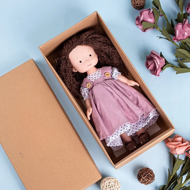 Dress-Up Plush Doll With Soft Vinyl Face And Removable Knitted Outfit