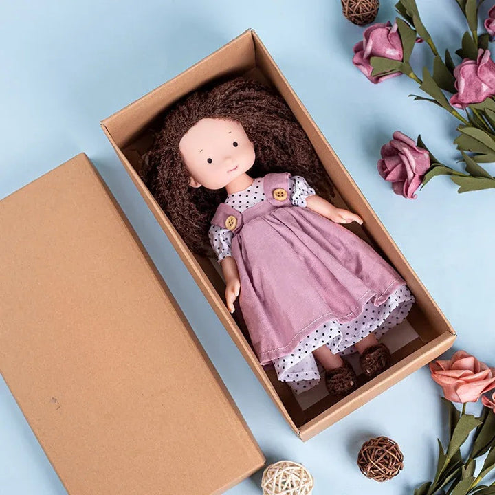 Dress-Up Plush Doll With Soft Vinyl Face And Removable Knitted Outfit