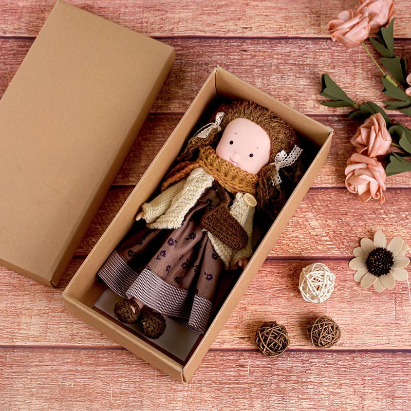 Dress-Up Plush Doll With Soft Vinyl Face And Removable Knitted Outfit