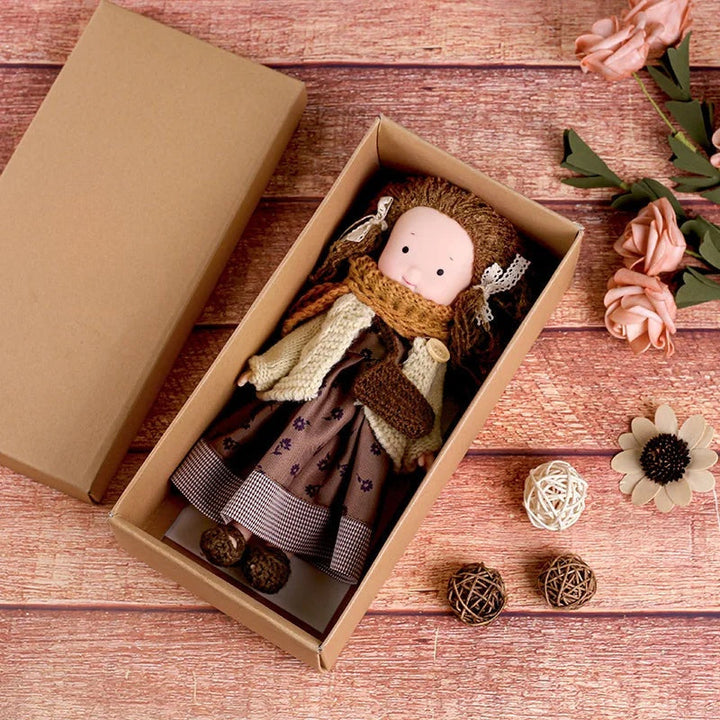 Dress-Up Plush Doll With Soft Vinyl Face And Removable Knitted Outfit