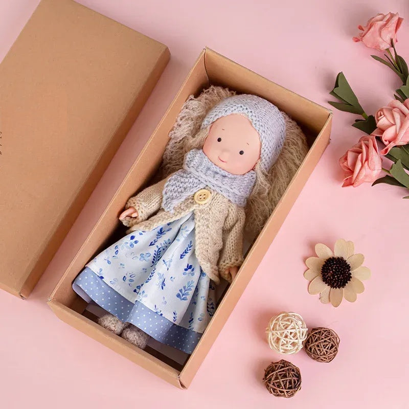 Dress-Up Plush Doll With Soft Vinyl Face And Removable Knitted Outfit