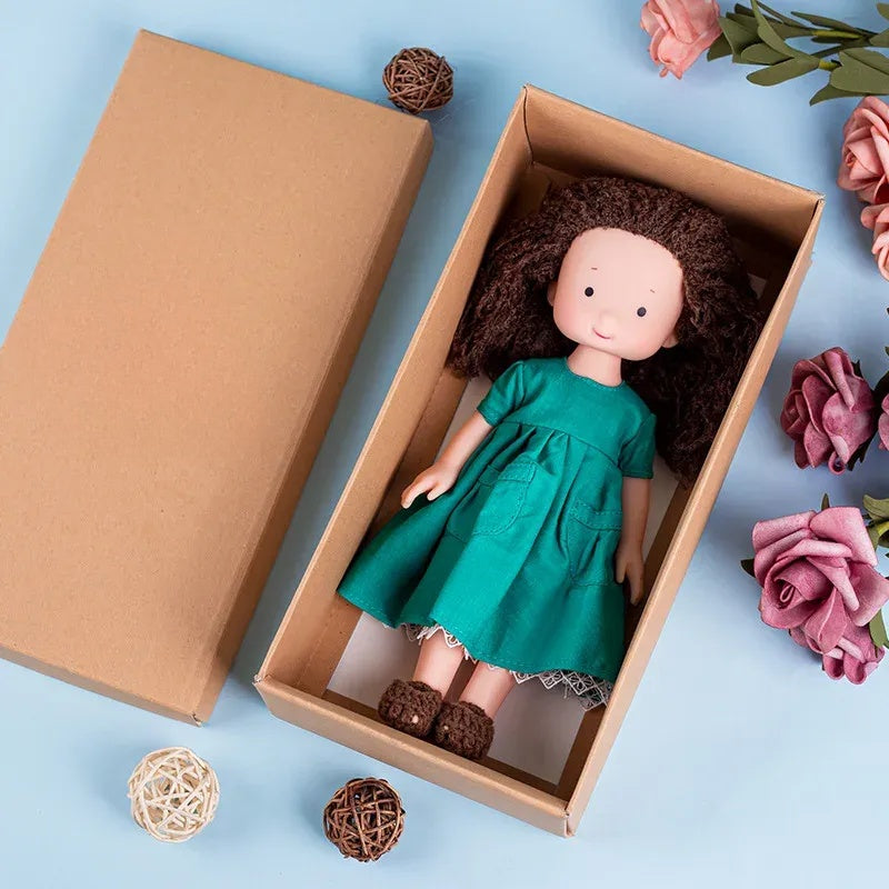 Dress-Up Plush Doll With Soft Vinyl Face And Removable Knitted Outfit