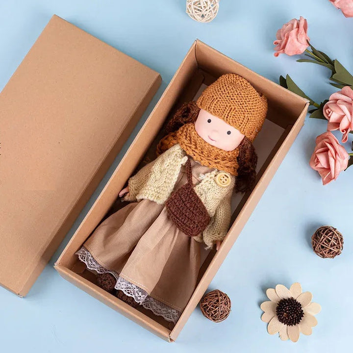 Dress-Up Plush Doll With Soft Vinyl Face And Removable Knitted Outfit